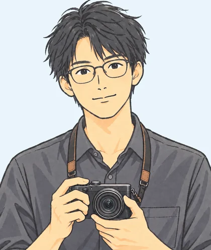 代表 山田雄大のイラスト（カメラを構えた姿）